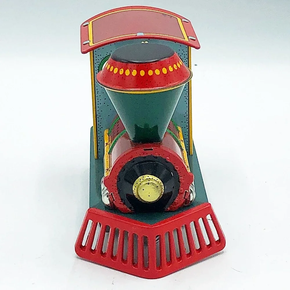 Yuletide Central #1 in ser Hallmark Ornament Tin Train 1994
